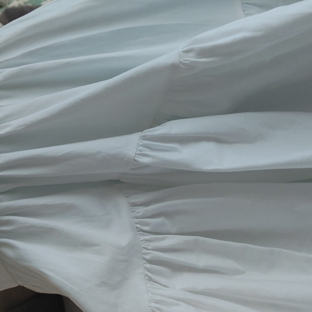 White Ruffled V‑Neck High‑Low Wedding Dress - Picture 3 of 13